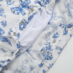 Blue and White Print Apron Ruffle Romper - Lil Cactus