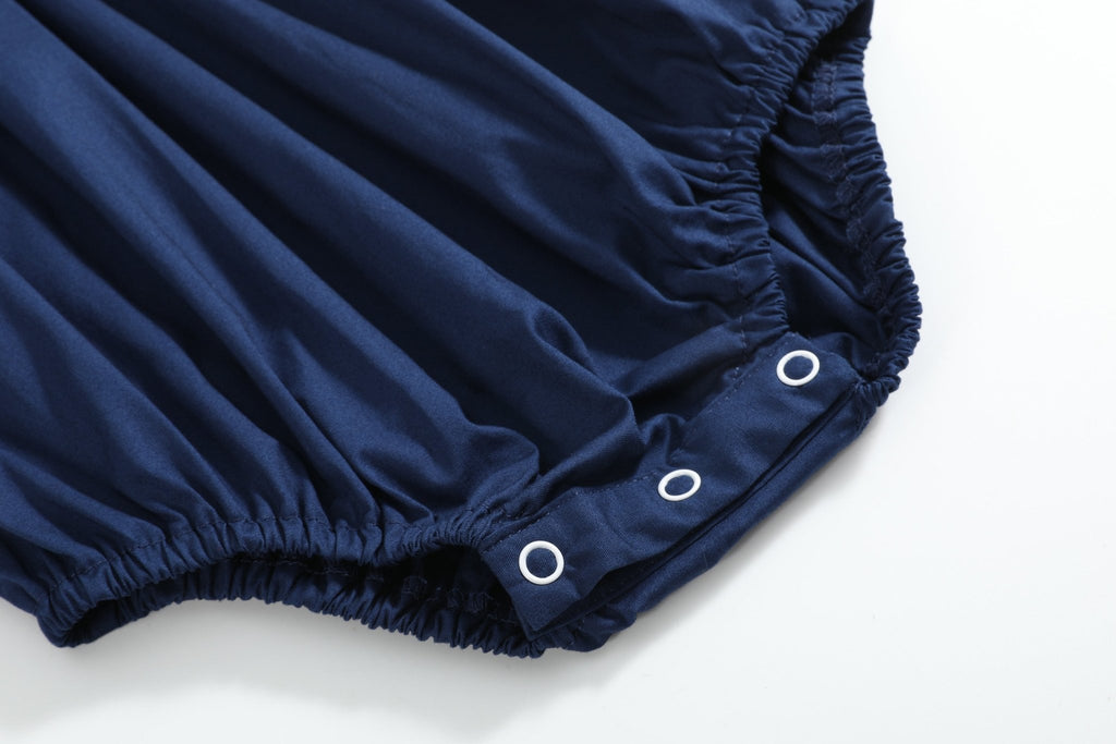 Blue Nativity Smocked Ruffle Romper - Lil Cactus