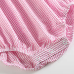 Pink Seersucker Running Bunnies Smocked Flutter Romper - Lil Cactus