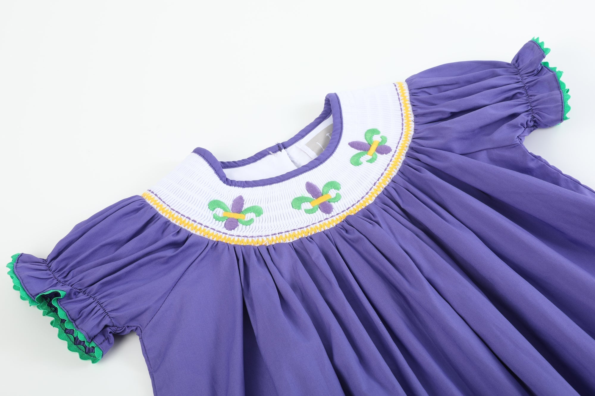 Purple Mardi Gras Smocked Bishop Dress - Lil Cactus Purple Mardi Gras Smocked Bishop Dress - Lil Cactus